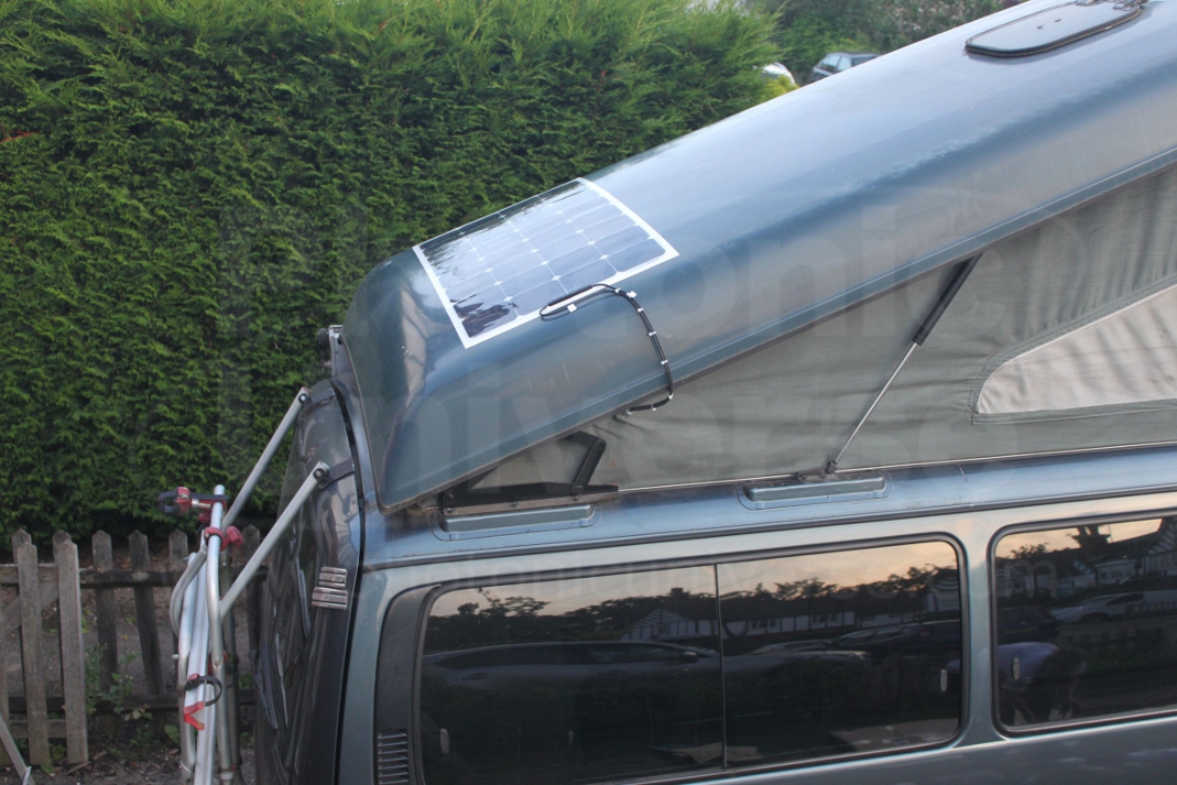 Installation of 100W flexible solar panel on Toyota campervan